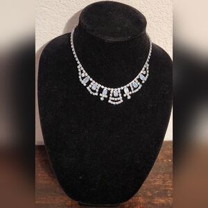 Elegant Silver Necklace with Blue Crystals And Has A Vintage Setting.